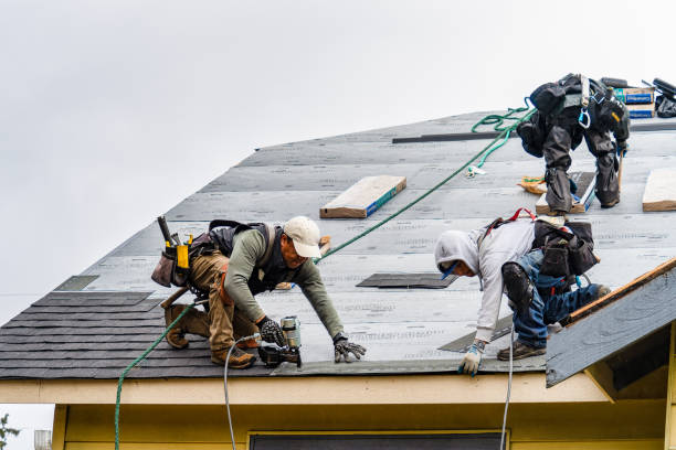 Professional Roof Replacement technician working in Coatesville, IN